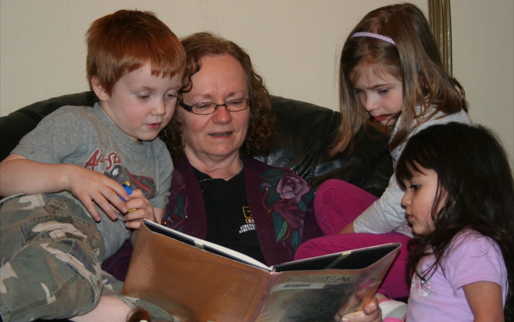 Irvina reading with children at A Quiet Forest Daycare and Preschool in Duvall, WA.