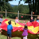 Children playing with Irvina at A Quiet Forest Daycare and Preschool in Duvall, WA
